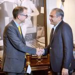 Federal Minister for Interior Mohsin Naqvi shaking hands with Director General of the UK National Crime Agency Graeme Biggar