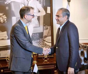 Federal Minister for Interior Mohsin Naqvi shaking hands with Director General of the UK National Crime Agency Graeme Biggar