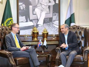 Federal Minister for Interior Mohsin Naqvi shaking hands with Director General of the UK National Crime Agency Graeme Biggar