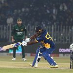Sri Lankan batter Kusal Perera plays a shot during the T20I Tri-Nation Series match between Sri Lanka and Pakistan at Pindi Cricket Stadium