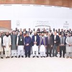 Federal Minister for Religious Affairs and Inter-Faith Harmony Sardar Muhammad Yousaf in a group photo with the Judges and Participants of First International Qirat competition after the inaugural session