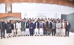 Federal Minister for Religious Affairs and Inter-Faith Harmony Sardar Muhammad Yousaf in a group photo with the Judges and Participants of First International Qirat competition after the inaugural session