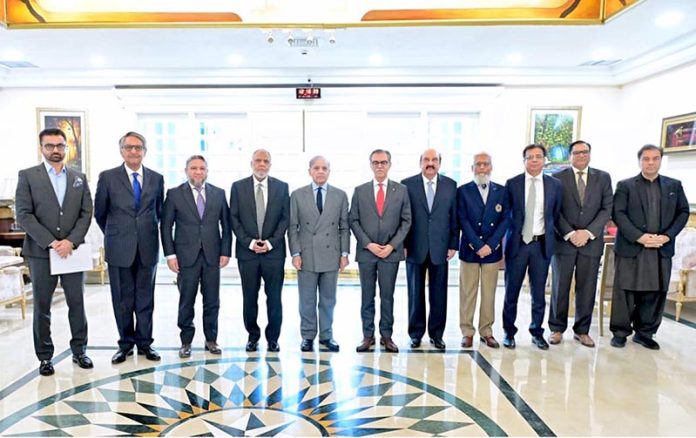Prime Minister Muhammad Shehbaz Sharif in a group photo with the board members of Jinnah Medical Complex