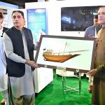 Minister for Livestock and Dairy Development Department Balochistan, Sardar Faisal Jamali, receives a souvenir during PIMEC 2025 at Expo Center Karachi