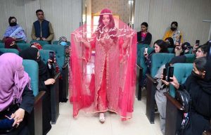 Art and Design students perform a cultural wedding-themed show on stage during the closing ceremony of the 3rd edition of the Dosti Peshawar Women’s Literature Festival 2025 at SBBWU.