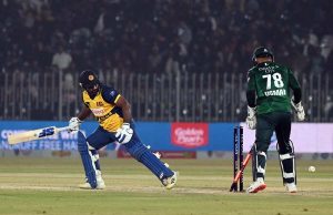 Sri Lankan batter Kusal Perera plays a shot during the T20I Tri-Nation Series match between Sri Lanka and Pakistan at Pindi Cricket Stadium
