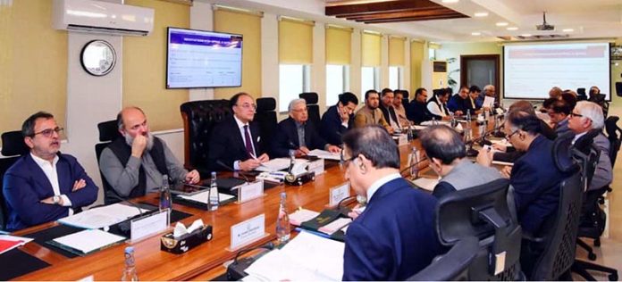 Federal Minister for Finance and Revenue, Senator Muhammad Aurangzeb chairing a meeting of the Economic Coordination Committee (ECC) of the Cabinet at the Finance Division