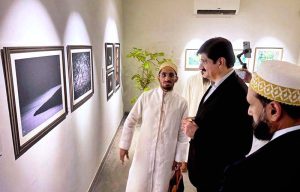 Sindh Chief Minister Syed Murad Ali Shah views an Islamic spiritual artwork at the inauguration of the “Light Upon Light” exhibition at Keol Art Gallery, curated by Radiant Arts and patronized by Dawat-e-Hadiya