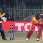 Sri Lanka’s Maheesh Theekshana hits the stumps to dismiss Zimbabwe’s Dion Myers in their Pakistan T20I Tri-Nation Series match at Rawalpindi Stadium..
