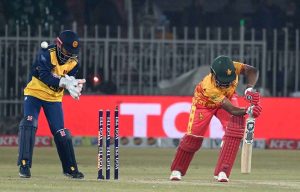 Sri Lanka’s Maheesh Theekshana hits the stumps to dismiss Zimbabwe’s Dion Myers in their Pakistan T20I Tri-Nation Series match at Rawalpindi Stadium..