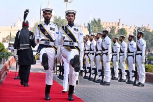 Pakistan Navy and Pakistan Rangers during change of guard ceremony to pay homage to the national poet Dr. Allama Muhammad Iqbal on his 148th birthday anniversary at Mazar-e-Iqbal