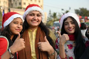 Women and children participates in the Welcome Christmas Rally