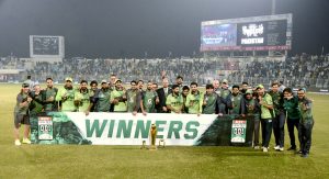 Pakistan team group photo with trophy after winning ODI series against South Africa team at Iqbal Stadium