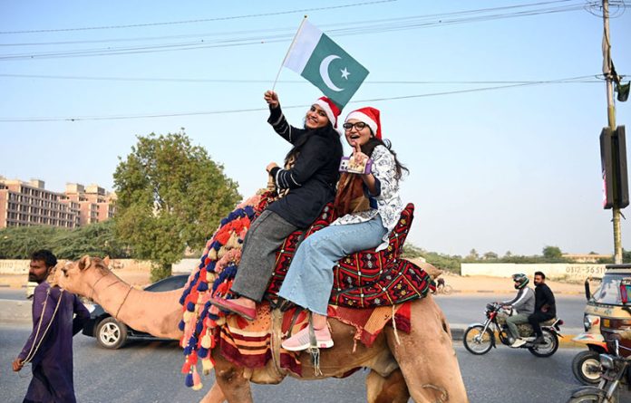 Girls participates in the Welcome Christmas Rally