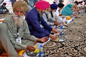 Indian Sikh pilgrims upon their arrival in Pakistan after crossing the India-Pakistan Wagah Border on the eve of celebrations marking the birth anniversary of Guru Nanak, the founder of Sikhism. Nearly two thousand Sikh pilgrims from India entered Pakistan in the first major crossing since deadly clashes in May led to the closure of the land border between the two neighbouring countries