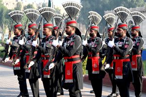 Pakistan Navy and Pakistan Rangers during change of guard ceremony to pay homage to the national poet Dr. Allama Muhammad Iqbal on his 148th birthday anniversary at Mazar-e-Iqbal
