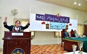 A student delivers speeches in inter-house English and Urdu competitions at Sadiq Public School