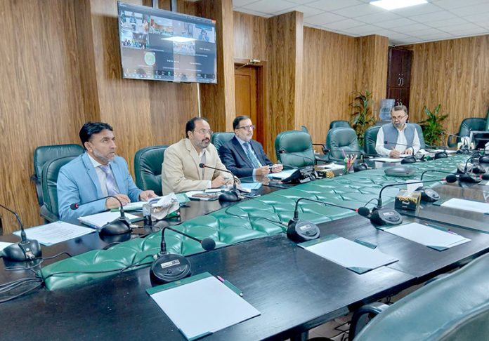 Amir Mohyuddin, Secretary Ministry of National Food Security & Research, chairing the weekly national coordination meeting to review wheat seed distribution, sowing progress, and storage planning across provinces