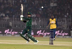 Sri Lankan batter Wanindu Hasaranga plays a shot during the T20I Tri-Nation Series match between Sri Lanka and Pakistan at Pindi Cricket Stadium