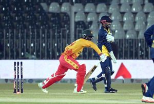 Sri Lanka’s Maheesh Theekshana hits the stumps to dismiss Zimbabwe’s Dion Myers in their Pakistan T20I Tri-Nation Series match at Rawalpindi Stadium..