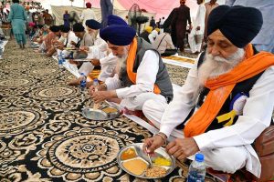 Indian Sikh pilgrims upon their arrival in Pakistan after crossing the India-Pakistan Wagah Border on the eve of celebrations marking the birth anniversary of Guru Nanak, the founder of Sikhism. Nearly two thousand Sikh pilgrims from India entered Pakistan in the first major crossing since deadly clashes in May led to the closure of the land border between the two neighbouring countries