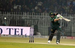 Sri Lankan batter Wanindu Hasaranga plays a shot during the T20I Tri-Nation Series match between Sri Lanka and Pakistan at Pindi Cricket Stadium