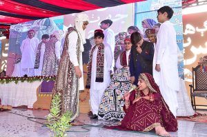Students performing tableau during Shah Latif Mela at Sindhi Language Authority.