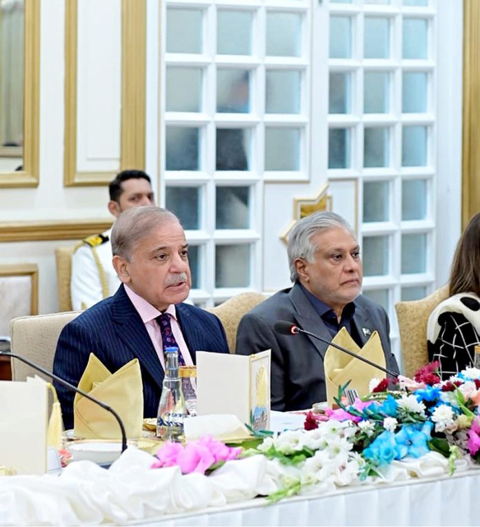 Prime Minister Muhammad Shehbaz Sharif addresses the banquet in honor of government and coalition Senators