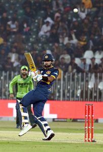 Pakistan players celebrates a wicket of Sri Lankan batter Kamindu Mendis during the 3rd one day international cricket match between Pakistan and Sri Lanka at Pindi Cricket Stadium.
