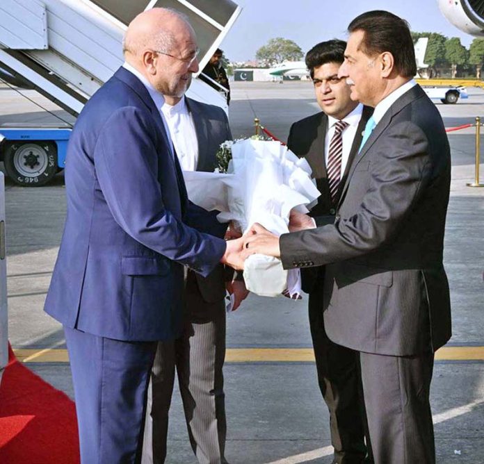Speaker National Assembly Sardar Ayaz Sadiq welcomes Speaker of the Islamic Consultative Assembly of Iran Mohammad Bagher Ghalibaf on his arrival at Nur Khan Airbase