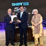 A souvenir is being presented to Acting President, Syed Yousuf Raza Gilani by Khurshid Mahmud Kasuri. former foreign minister of Pakistan at the closing session of "Rethinking Education" on the 50th anniversary of the school of tomorrow (SOT) event at Jinnah Convention Centre