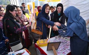 Secretary, Khyber Pakhtunkhwa Commission on the Status of Women, Ms. Shazia Atta, along with officials and organizers, visits various stalls during the Dosti Peshawar Women Literature Festival – 3rd Edition at SBBWU