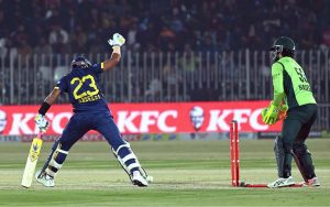 Pakistan players celebrates a wicket of Sri Lankan batter Kamindu Mendis during the 3rd one day international cricket match between Pakistan and Sri Lanka at Pindi Cricket Stadium.