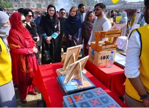 Secretary, Khyber Pakhtunkhwa Commission on the Status of Women, Ms. Shazia Atta, along with officials and organizers, visits various stalls during the Dosti Peshawar Women Literature Festival – 3rd Edition at SBBWU
