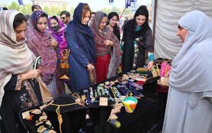 Secretary, Khyber Pakhtunkhwa Commission on the Status of Women, Ms. Shazia Atta, along with officials and organizers, visits various stalls during the Dosti Peshawar Women Literature Festival – 3rd Edition at SBBWU