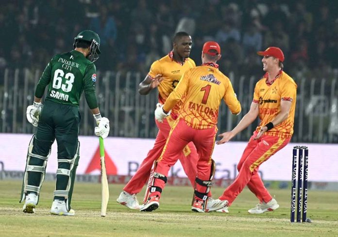 Zimbabwe batsman Tadiwanashe Marumani plays a shot during the Pakistan T20I Tri-Nation Series cricket match against Pakistan in Rawalpindi stadium