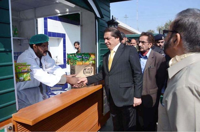 Federal Minister for Railways, Muhammad Hanif Abbasi, inspects the quality and hygiene standards of food items at shops during his visit to Faisalabad Railway Station