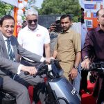 Chairman Water Corporation and Mayor Karachi, Mr. Murtaza Wahab, Deputy Mayor Karachi, Salman Abdullah Murad are seated on EV bikes at the inauguration of Karachi Water Corporation's first station suction machines and four electric vehicle charging stations at Sharaa Faisal Karsaz