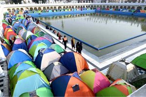 Sikh yatrees performing their religious rituals on the occasion of 556th birth anniversary of Guru Nanak Dev in Nankana Sahib, Guru Nanak was the founder of the religion of Sikhism and the first of ten Sikh Gurus. His birth is celebrated worldwide as Guru Nanak Gurpurab on Kartik Pooranmashi, the full-moon day in the month of Katak, October–November