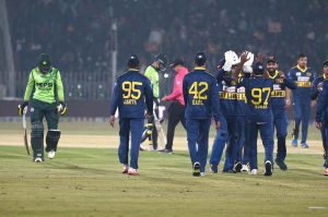 Sri Lankan players celebrates a wicket of Pakistani batter Haseebullah Khan during the 3rd one day international cricket match between Pakistan and Sri Lanka at Pindi Cricket Stadium.