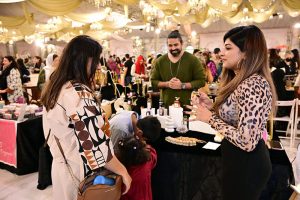Women visit stalls at the Crafters Expo 2025