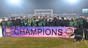 Pakistan Cricket Team and PCB officials posing for a group photograph with the trophy after winning the final cricket match of Pakistan T20I Tri-Nation Series against Sri Lanka in Rawalpindi Cricket Stadium.