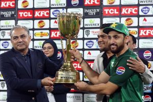 Pakistan’s captain Salman Ali Agha receives the trophy from PCB Chairman Mohsin Naqvi after winning the series and the third Twenty20 International cricket match between Pakistan and South Africa at the Gaddafi Cricket Stadium.