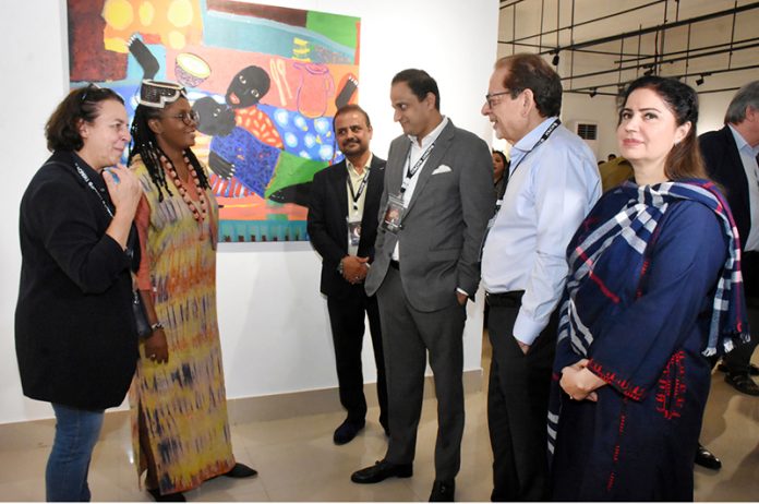 The Arts Council of Pakistan Karachi is organizing an exhibition on the 21st day of the 39-day World Culture Festival, showcasing the works of Pakistani and international artists. Peace & Pieces, Burkina Faso in Volume 4, illustrated by Adjaratou Ouedraoga. Mayor of Karachi, Barrister Murtaza Wahab and President Arts Council Muhammad Ahmed Shah briefed about the artworks. Renowned painter Shahid Rassam and Chairperson of the Doman Empowerment Committee Chand Gul Shah are present on this occasion