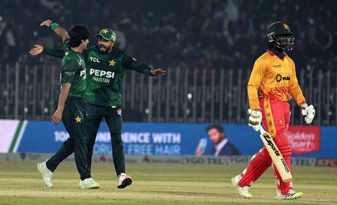 Pakistani players celebrates a wicket of Zimbabwe’s Tadiwanashe Marumani during the Pakistan T20I Tri-Nation Series cricket match between Zimbabwe and Pakistan at Pindi Cricket Stadium