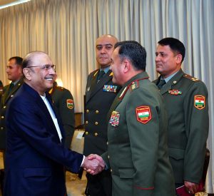 President Asif Ali Zardari shaking hands with Colonel General Sabirzoda Emomali Abdulrahim, Defence Minister of Tajikistan, at Aiwan-e-Sadr.