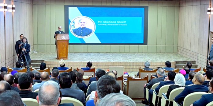 Prime Minister Muhammad Shehbaz Sharif addresses an event to mark 