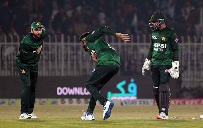 Pakistani player celebrates a wicket of Zimbabwe’s batter Tashinga Musekiwa during the Pakistan T20I Tri-Nation Series cricket match between Zimbabwe and Pakistan at Pindi Cricket Stadium