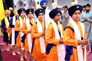 Sikh yatrees performing their religious rituals on the occasion of 556th birth anniversary of Guru Nanak Dev in Nankana Sahib, Guru Nanak was the founder of the religion of Sikhism and the first of ten Sikh Gurus. His birth is celebrated worldwide as Guru Nanak Gurpurab on Kartik Pooranmashi, the full-moon day in the month of Katak, October–November