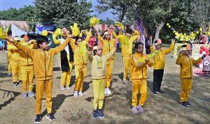 Smart School children celebrate after winning the Sports Gala Winner’s Trophy.
